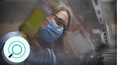 hospital staff in mask undertaking research